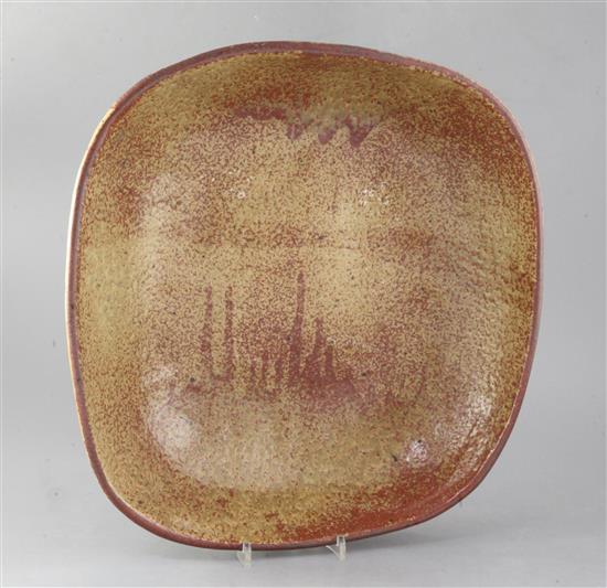 Pierre Culot (Belgian 1938-2011). A red/brown-glazed large stoneware dish, diameter 41cm